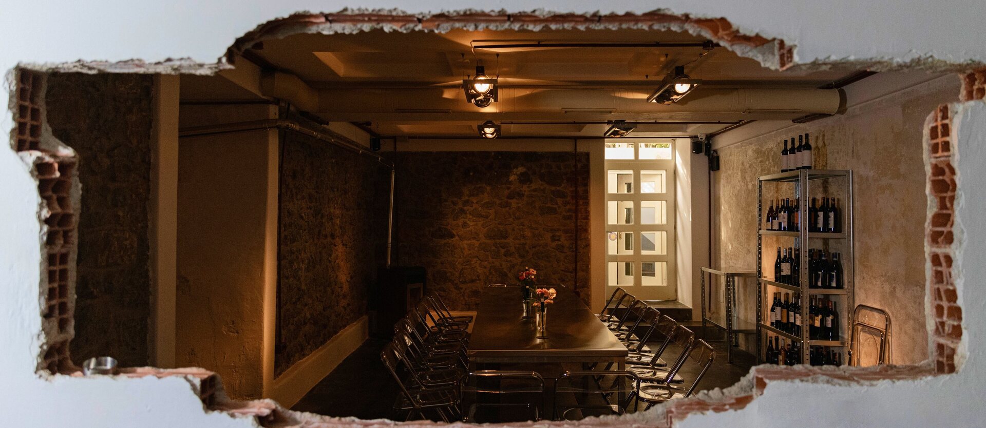 The room at Tavolina, seen through the opening in the wall